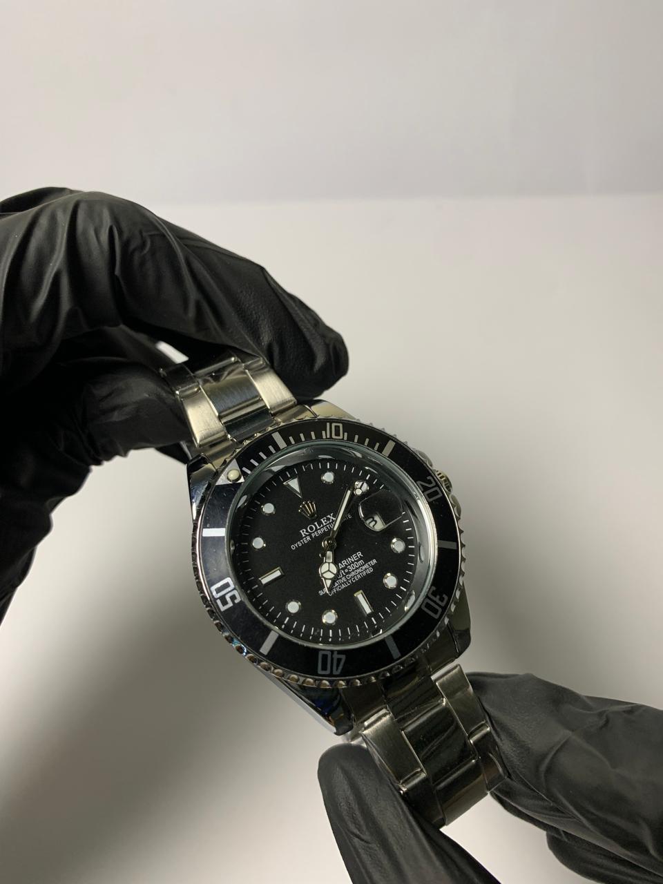 Rolex Submariner black rotating dial with Butterfly Lock