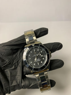 Rolex Submariner black rotating dial with Butterfly Lock